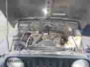 1998 Jeep Wrangler SE z VIN 1J4FY29P6WP765254, wystawiony jako IAAI lot #43342210 z przebiegiem 128 384 mil mil oraz . Historia ofert i sprzedaży dostępna na DreamBid. Obrazek 10.