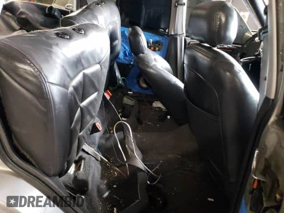 1998 Jeep Grand Cherokee Limited z VIN 1J4GZ78S9WC308708, wystawiony jako Copart lot #79315694 z przebiegiem 205 976 mil mil oraz Szkoda całkowita • Salvage title. Historia ofert i sprzedaży dostępna na DreamBid. Obrazek 11.