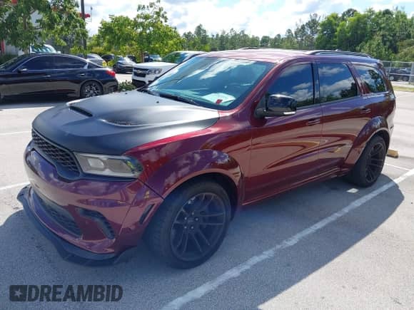 2021 Dodge Durango SRT Hellcat with VIN 1C4SDJH91MC716142, listed as a IAAI auction lot 43523331 with 37,058 mi miles and . Bid and sale history available at DreamBid. Image 2.