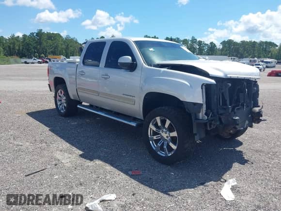 2010 GMC Sierra 1500 SLT with VIN 3GTRKWE30AG126587, listed as a IAAI auction lot 41773552 with 85,032 mi miles and . Bid and sale history available at DreamBid. Image 1.