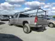 2003 Chevrolet Silverado 2500HD LT z VIN 1GCHK29153E171662, wystawiony jako Copart lot #80114585 z przebiegiem Nie podano mil oraz Szkoda całkowita • Salvage title. Historia ofert i sprzedaży dostępna na DreamBid. Obrazek 2.