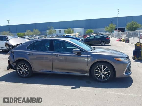 2021 Toyota Camry Hybrid XLE with VIN 4T1F31AK9MU560049, listed as a IAAI auction lot 42211169 with 182,185 mi miles and . Bid and sale history available at DreamBid. Image 14.
