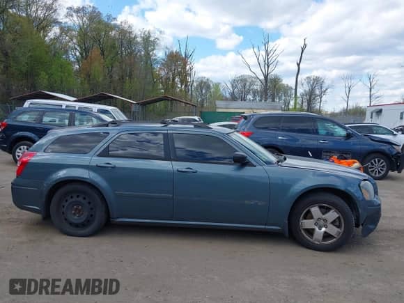 2005 Dodge Magnum SXT with VIN 2D4GZ48V15H647072, listed as a IAAI auction lot 42037095 with 187,904 mi miles and . Bid and sale history available at DreamBid. Image 13.