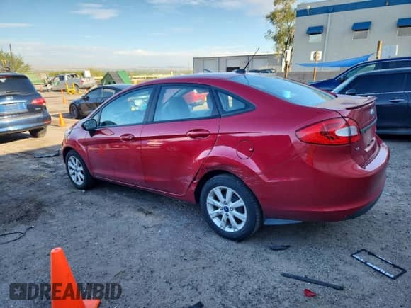 2012 Ford Fiesta SE с VIN 3FADP4BJ4CM126282, выставлен на аукционе Copart как лот 70578555 с пробегом 50 985 миль миль и Списание • Salvage title. История ставок и продаж доступна на DreamBid. Изображение 2.