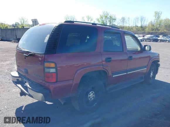 2005 Chevrolet Tahoe LS with VIN 1GNEK13T55J205379, listed as a IAAI auction lot 42143024 with 151,132 mi miles and . Bid and sale history available at DreamBid. Image 4.