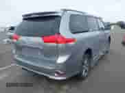 2014 Toyota Sienna SE with VIN 5TDXK3DC6ES421515, listed as a IAAI auction lot 43102179 with 63,756 mi miles and . Bid and sale history available at DreamBid. Image 4.