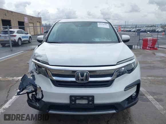 2020 Honda Pilot EX z VIN 5FNYF5H34LB019069, wystawiony jako IAAI lot #41538583 z przebiegiem 55 424 mil mil oraz . Historia ofert i sprzedaży dostępna na DreamBid. Obrazek 13.
