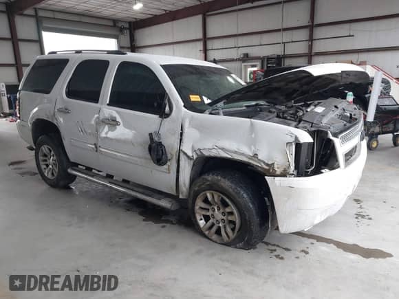 2013 Chevrolet Tahoe LS z VIN 1GNSCAE09DR249095, wystawiony jako IAAI lot #41290129 z przebiegiem Nie podano mil oraz . Historia ofert i sprzedaży dostępna na DreamBid. Obrazek 1.