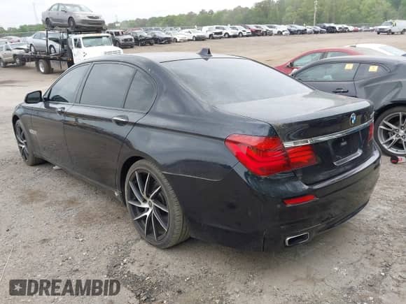 2013 BMW 7 Series 750Li with VIN WBAYE8C58DDE22378, listed as a IAAI auction lot 42104967 with 156,421 mi miles and . Bid and sale history available at DreamBid. Image 3.