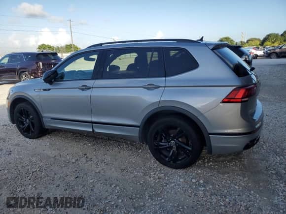 2023 Volkswagen Tiguan SE R-Line Black с VIN 3VVCB7AX4PM054406, выставлен на аукционе Copart как лот 85553844 с пробегом Не указан миль и Списание • Salvage title. История ставок и продаж доступна на DreamBid. Изображение 2.