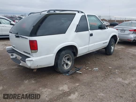 2002 Chevrolet Blazer LS с VIN 1GNCS18W42K105497, выставлен на аукционе IAAI как лот 41572072 с пробегом 142 486 миль миль и . История ставок и продаж доступна на DreamBid. Изображение 4.