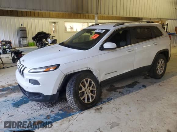 2014 Jeep Cherokee Latitude z VIN 1C4PJMCS4EW145546, wystawiony jako Copart lot #61670295 z przebiegiem 191 380 mil mil oraz Szkoda całkowita • Salvage title. Historia ofert i sprzedaży dostępna na DreamBid. Obrazek 1.