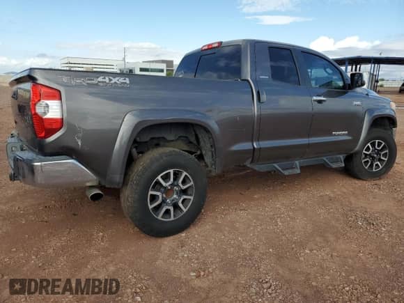 2014 Toyota Tundra Limited с VIN 5TFBW5F17EX399458, выставлен на аукционе Copart как лот 82438125 с пробегом 193 781 миль миль и Списание • Salvage title. История ставок и продаж доступна на DreamBid. Изображение 3.