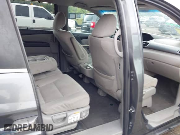 2012 Honda Odyssey EX z VIN 5FNRL5H40CB083650, wystawiony jako IAAI lot #43283741 z przebiegiem 164 693 mil mil oraz . Historia ofert i sprzedaży dostępna na DreamBid. Obrazek 8.