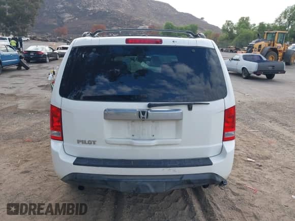 2013 Honda Pilot EX-L with VIN 5FNYF3H57DB013029, listed as a IAAI auction lot 43271400 with 137,407 mi miles and . Bid and sale history available at DreamBid. Image 16.