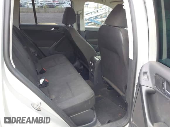 2013 Volkswagen Tiguan S with VIN WVGBV3AXXDW580007, listed as a IAAI auction lot 43104824 with 203,479 mi miles and . Bid and sale history available at DreamBid. Image 8.