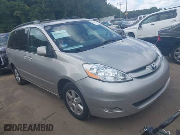 2009 Toyota Sienna XLE with VIN 5TDZK22C79S257834, listed as a IAAI auction lot 43212146 with 184,750 mi miles and . Bid and sale history available at DreamBid. Image 1.