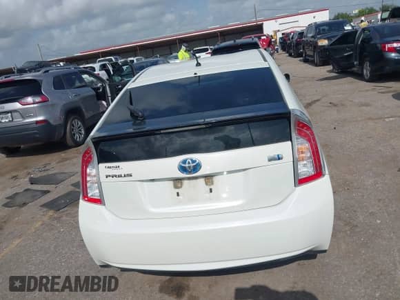 2015 Toyota Prius Four z VIN JTDKN3DU7F1917285, wystawiony jako IAAI lot #42536395 z przebiegiem 265 498 mil mil oraz . Historia ofert i sprzedaży dostępna na DreamBid. Obrazek 16.