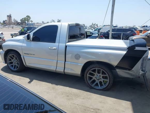 2005 Dodge RAM with VIN 3D3HA16H75G830570, listed as a IAAI auction lot 42586838 with 40,449 mi miles and . Bid and sale history available at DreamBid. Image 15.
