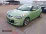 2012 Hyundai Veloster w/Gray Int z VIN KMHTC6AD6CU052668, wystawiony jako IAAI lot #43165096 z przebiegiem 156 135 mil mil oraz . Historia ofert i sprzedaży dostępna na DreamBid. Obrazek 2.