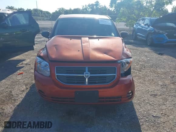 2010 Dodge Caliber SXT with VIN 1B3CB4HA4AD632362, listed as a IAAI auction lot 43130784 with 192,276 mi miles and . Bid and sale history available at DreamBid. Image 12.