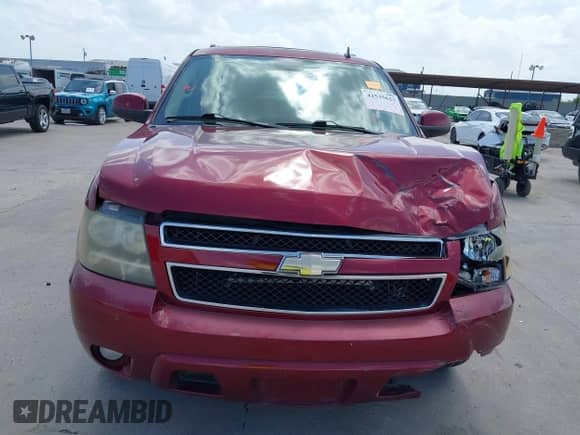 2010 Chevrolet Suburban LT z VIN 1GNUCJE03AR267838, wystawiony jako IAAI lot #42535623 z przebiegiem 265 769 mil mil oraz . Historia ofert i sprzedaży dostępna na DreamBid. Obrazek 12.