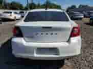 2013 Dodge Avenger SE z VIN 1C3CDZAB3DN730830, wystawiony jako Copart lot #70456914 z przebiegiem 140 616 mil mil oraz Szkoda całkowita • Salvage title. Historia ofert i sprzedaży dostępna na DreamBid. Obrazek 6.