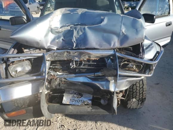 1997 Toyota Tacoma z VIN 4TAWM72N4VZ256544, wystawiony jako Copart lot #86303685 z przebiegiem 245 875 mil mil oraz Szkoda całkowita • Salvage title. Historia ofert i sprzedaży dostępna na DreamBid. Obrazek 11.