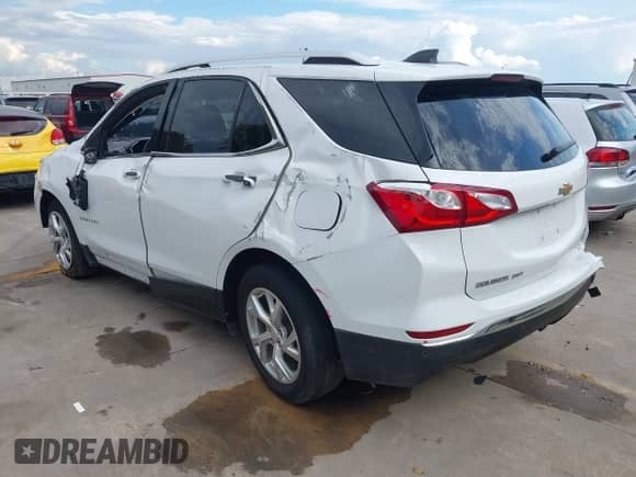 2018 Chevrolet Equinox LT with VIN 2GNAXKEX5J6158772, listed as a IAAI auction lot 43394872 with 102,480 mi miles and . Bid and sale history available at DreamBid. Image 3.