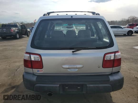 2002 Subaru Forester L with VIN JF1SF63532H752352, listed as a Copart auction lot 54620825 with 83,647 mi miles and Salvage title. Bid and sale history available at DreamBid. Image 6.