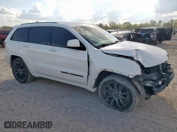 2017 Jeep Grand Cherokee Altitude with VIN 1C4RJFAG6HC817664, listed as a Copart auction lot 85121865 with 105,142 mi miles and Salvage title. Bid and sale history available at DreamBid. Image 4.