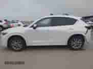 2025 Mazda CX-5 S Preferred с VIN JM3KFBCL0S0571653, выставлен на аукционе IAAI как лот 42297810 с пробегом 4 422 миль миль и . История ставок и продаж доступна на DreamBid. Изображение 14.
