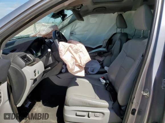 2018 Honda Pilot Touring с VIN 5FNYF5H94JB020448, выставлен на аукционе Copart как лот 65833715 с пробегом 146 320 миль миль и Списание • Salvage title. История ставок и продаж доступна на DreamBid. Изображение 7.