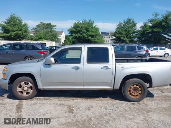 2010 Chevrolet Colorado 1LT z VIN 1GCDSCDE7A8140360, wystawiony jako IAAI lot #42660572 z przebiegiem 147 641 mil mil oraz . Historia ofert i sprzedaży dostępna na DreamBid. Obrazek 14.