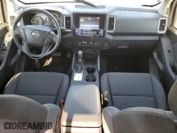 2022 Nissan Frontier SV with VIN 1N6ED1FJ4NN631759, listed as a Copart auction lot 77612174 with 29,828 mi miles and Salvage title. Bid and sale history available at DreamBid. Image 8.