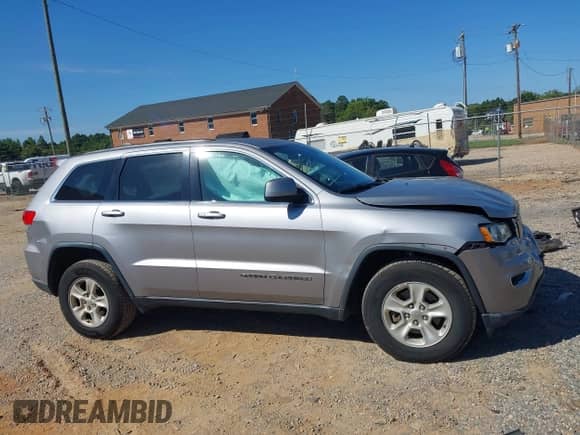2017 Jeep Grand Cherokee Laredo with VIN 1C4RJEAGXHC671814, listed as a IAAI auction lot 43097972 with 165,240 mi miles and . Bid and sale history available at DreamBid. Image 13.