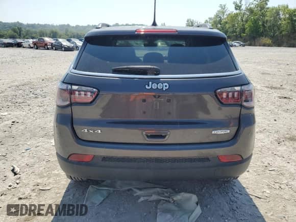 2021 Jeep Compass Latitude with VIN 3C4NJDBB2MT552035, listed as a Copart auction lot 69130975 with 105,058 mi miles and Salvage title. Bid and sale history available at DreamBid. Image 6.