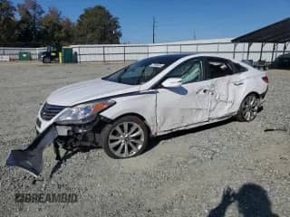 2017 Hyundai Azera Limited z VIN KMHFH4JG5HA590574, wystawiony jako Copart lot #77846934 z przebiegiem Nie podano mil oraz Szkoda całkowita • Salvage title. Historia ofert i sprzedaży dostępna na DreamBid. Obrazek 1.