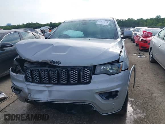 2020 Jeep Grand Cherokee Altitude with VIN 1C4RJFAG4LC116551, listed as a IAAI auction lot 43021481 with 129,650 mi miles and . Bid and sale history available at DreamBid. Image 13.