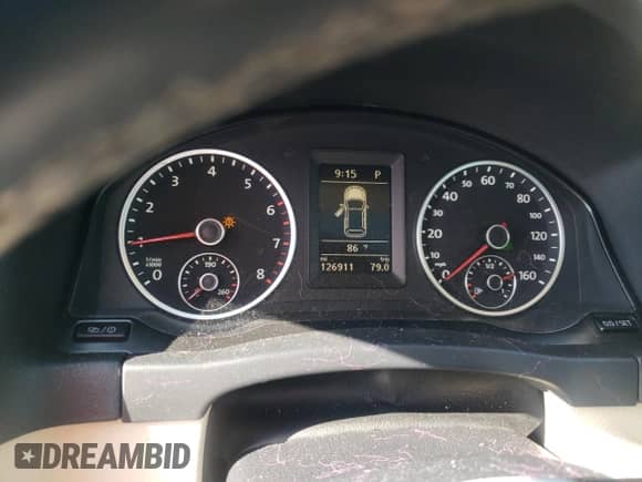 2013 Volkswagen Tiguan SE с VIN WVGAV7AX7DW555195, выставлен на аукционе Copart как лот 61065725 с пробегом 126 911 миль миль и Списание • Salvage title. История ставок и продаж доступна на DreamBid. Изображение 9.