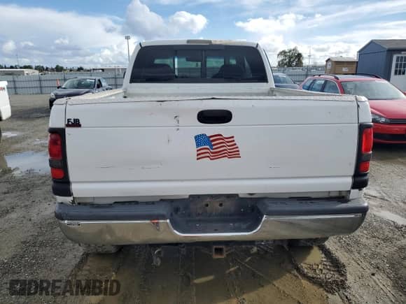1999 Dodge 2500 with VIN 1B7KF23Z0XJ575779, listed as a Copart auction lot 49535585 with 185,237 mi miles and Clean title. Bid and sale history available at DreamBid. Image 6.
