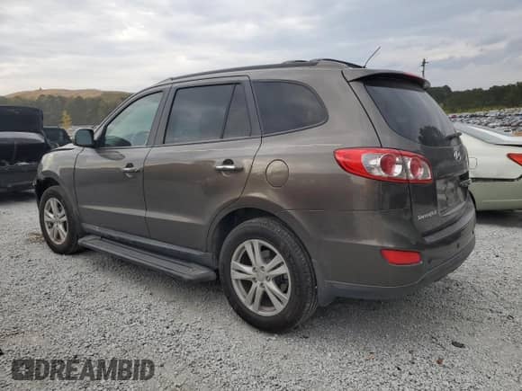 2012 Hyundai Santa Fe Limited с VIN 5XYZK3AB5CG142412, выставлен на аукционе Copart как лот 82600135 с пробегом 139 986 миль миль и Чистый • Clean title. История ставок и продаж доступна на DreamBid. Изображение 2.