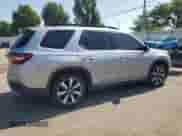 2023 Honda Pilot Touring с VIN 5FNYG1H71PB039231, выставлен на аукционе Copart как лот 61742805 с пробегом 39 920 миль миль и Списание • Salvage title. История ставок и продаж доступна на DreamBid. Изображение 3.