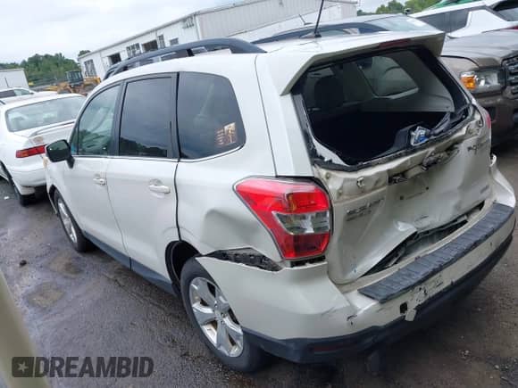 2014 Subaru Forester Touring z VIN JF2SJAPC7EH536627, wystawiony jako IAAI lot #42862912 z przebiegiem 114 727 mil mil oraz . Historia ofert i sprzedaży dostępna na DreamBid. Obrazek 3.
