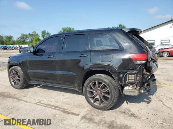2021 Jeep Grand Cherokee High Altitude with VIN 1C4RJFCG0MC584761, listed as a Copart auction lot 61756955 with 71,233 mi miles and Salvage title. Bid and sale history available at DreamBid. Image 2.