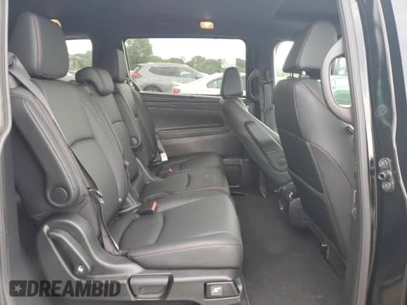 2025 Honda Odyssey Sport-L z VIN 5FNRL6H71SB057590, wystawiony jako Copart lot #65234495 z przebiegiem 4 156 mil mil oraz Nie do naprawy • Non repairable. Historia ofert i sprzedaży dostępna na DreamBid. Obrazek 11.