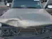 2000 Chevrolet Silverado 1500 LS with VIN 2GCEK19T1Y1280577, listed as a Copart auction lot 63844555 with 327,774 mi miles and Salvage title. Bid and sale history available at DreamBid. Image 11.