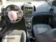 2012 Chevrolet Sonic LT z VIN 1G1JD6SH1C4197474, wystawiony jako Copart lot #69278695 z przebiegiem 144 790 mil mil oraz Szkoda całkowita • Salvage title. Historia ofert i sprzedaży dostępna na DreamBid. Obrazek 8.