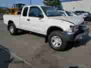 2000 Toyota Tacoma PreRunner with VIN 5TESN92N3YZ696470, listed as a Copart auction lot 65285025 with 339,005 mi miles and Salvage title. Bid and sale history available at DreamBid. Image 4.