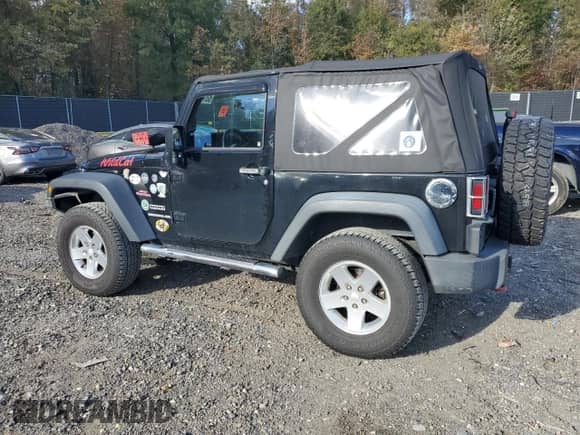 2012 Jeep Wrangler Sport with VIN 1C4AJWAG4CL237299, listed as a Copart auction lot 82743155 with 226,287 mi miles and Clean title. Bid and sale history available at DreamBid. Image 2.